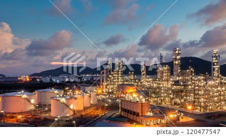 Oil and gas refinery industrial storage tank with oil and gas refinery plant at night, Refinery oil and gas power energy industrial, Oil and gas refinery petrochemical product plant pipeline steel. Oil and gas refinery industrial storage tank with oil and gas refinery plant at night, Refinery oil and gas power energy industrial, Oil and gas refinery petrochemical product plant pipeline steel. 120477547