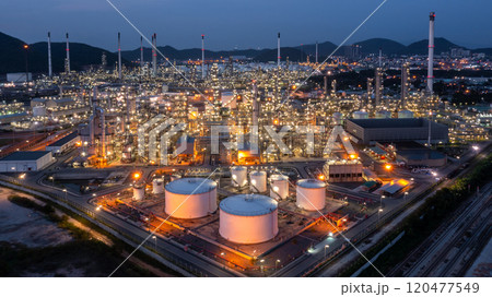Oil and gas refinery industrial storage tank with oil and gas refinery plant at night, Refinery oil and gas power energy industrial, Oil and gas refinery petrochemical product plant pipeline steel. 120477549