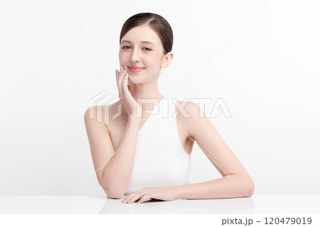 Beautiful young woman with clean fresh skin on white background, Face care, Facial treatment, Cosmetology, beauty and spa, women portrait. Beautiful young woman with clean fresh skin on white background, Face care, Facial treatment, Cosmetology, beauty and spa, women portrait. 120479019