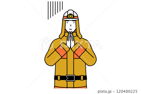 体の前で手を合わせて謝る防火服姿の消防士 120480225