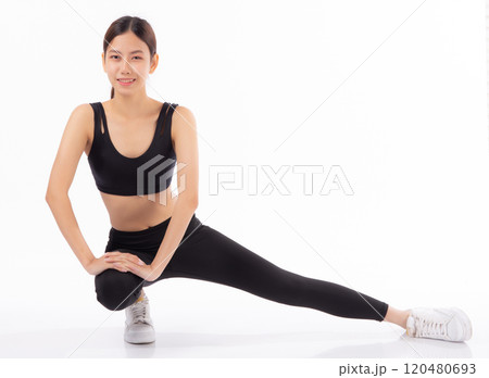 Portrait young asian woman in sportswear stretching muscle leg for health isolated white background. 120480693