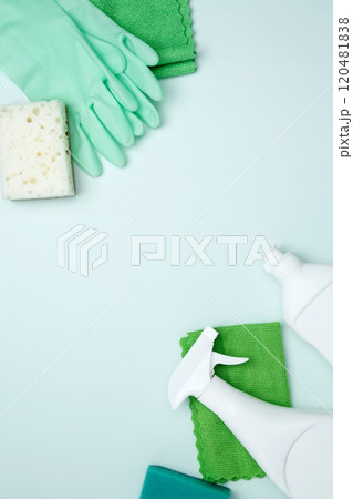 Cleaning supplies and tools, including bottles, gloves, sponges, and cloths. Concept of cleanliness and hygiene 120481838