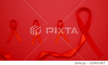 World AIDS Day. Red ribbons with awareness about AIDS World AIDS Day. Red ribbons with awareness about AIDS 120481967