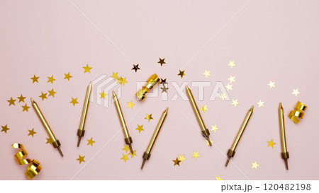 Concept of festive birthday celebrations. Blank card surrounded by confetti and candle 120482198