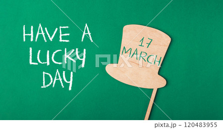 A green background with a hat on it A green background with a hat on it 120483955