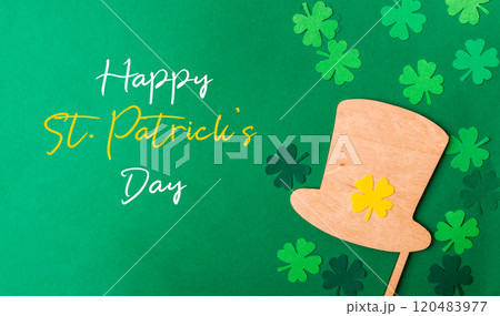 Green background with a hat and shamrock on it 120483977