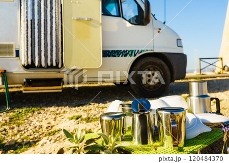 Clean dishes drying on fresh air, capming outdoor 120484370