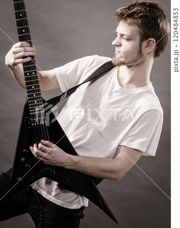 Man playing on electric guitar Man playing on electric guitar 120484853