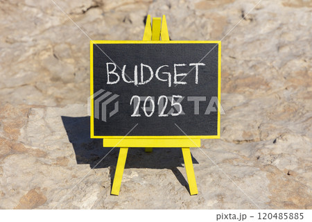 Planning budget 2025 new year symbol. Concept words Budget 2025 on beautiful yellow chalk blackboard. Beautiful stone beach background. Business budget 2025 new year concept. Copy space. 120485885