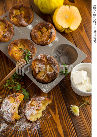 cooked cottage cheese muffins with quince and honey cooked cottage cheese muffins with quince and honey 120487688