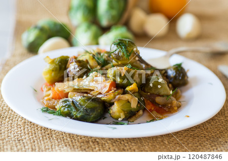 Brussel sprouts cooked with vegetables and spices 120487846