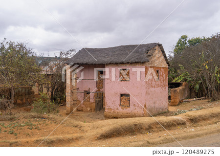 Traditional Malagasy houses in a rural setting. 120489275