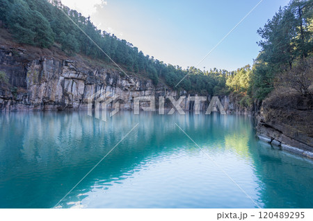 Stunning Lac Tritriva Volcanic Lake Surrounded by Gneiss Cliffs, Madagascar. 120489295