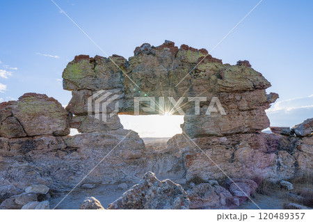 Sunset Through Natural Rock Window in Isalo National Park, Madagascar. 120489357