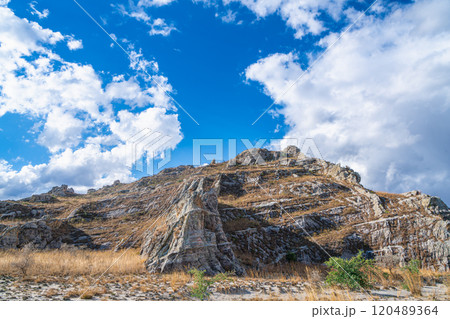 Majestic Sandstone Cliffs and Golden Grassland. Isalo National Park, Madagascar. Majestic Sandstone Cliffs and Golden Grassland. Isalo National Park, Madagascar. 120489364