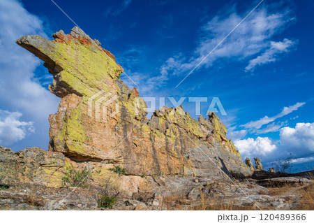 Monster-shaped Rock Formation Against Blue Sky at Isalo National Park. Monster-shaped Rock Formation Against Blue Sky at Isalo National Park. 120489366