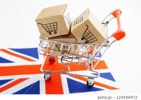 Online shopping, Shopping cart box on United Kingdom flag, import export, finance commerce. Online shopping, Shopping cart box on United Kingdom flag, import export, finance commerce. 120490472