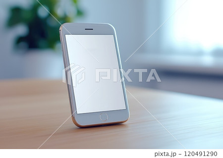 Minimalist Smartphone on Wooden Table in Bright Room with Soft Natural Light, Perfect for Showcasing Mobile Technology and Modern Lifestyle Concepts 120491290