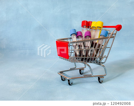 Some glasses vacutainer with blood analysis in a shopping basket. Some glasses vacutainer with blood analysis in a shopping basket. 120492008