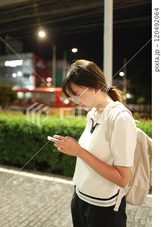 Asian Woman with Smart Phone Asian Woman with Smart Phone 120492064