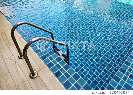 Stainless steel swimming pool ladder. Stainless steel swimming pool ladder. 120492084