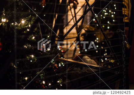 the night streets of Larnaca, Cyprus are decorated for the New Year and Christmas 120492425
