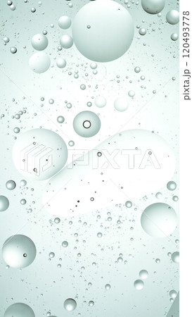 Macro Shot of Moving Oil Bubbles on Light Background 120493778