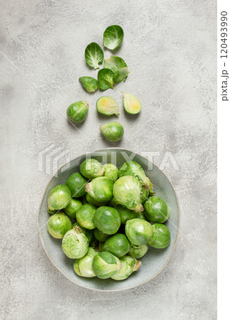 fresh Brussels sprouts, raw, top view, on a gray table, no people, fresh Brussels sprouts, raw, top view, on a gray table, no people, 120493990