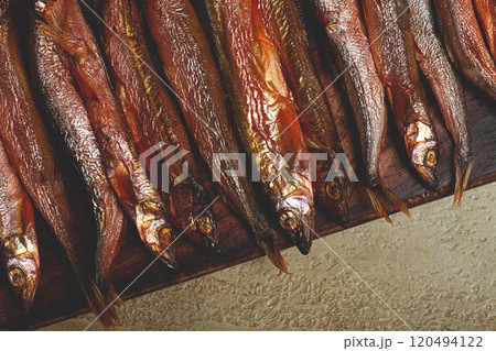 cold smoked capelin, on a wooden chopping board, no people, cold smoked capelin, on a wooden chopping board, no people, 120494122