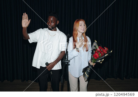 Expressing Gratitude After Performance on Stage 120494569