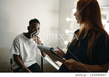Discussing Script and Preparing Roles With Director Discussing Script and Preparing Roles With Director 120494687