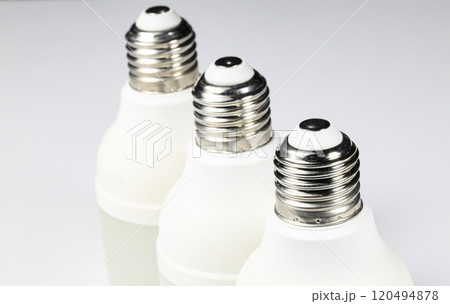White LED bulb or light bulb with connector type e27 for energy saving isolated on white background. 120494878