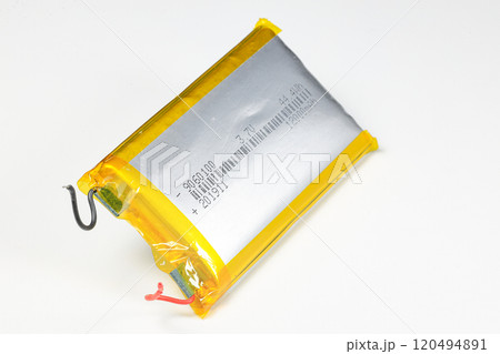 damaged swollen Lithium polymer, Li-ion batteries for mobile device isolated on white background. damaged swollen Lithium polymer, Li-ion batteries for mobile device isolated on white background. 120494891