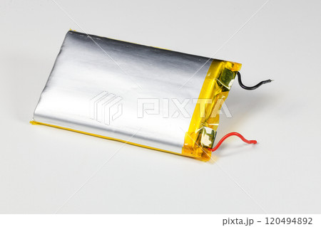 damaged swollen Lithium polymer, Li-ion batteries for mobile device isolated on white background. damaged swollen Lithium polymer, Li-ion batteries for mobile device isolated on white background. 120494892