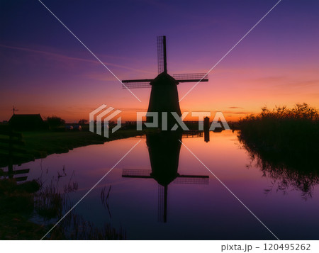 Windmill in the Netherlands. Historical buildings in the Netherlands. Windmill in the Netherlands. Historical buildings in the Netherlands. 120495262
