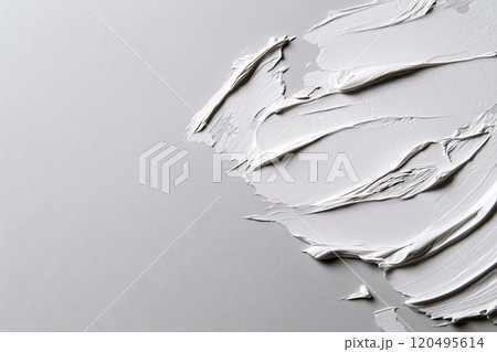 White Creamy Cosmetic Product Swirled on Gray Background 120495614