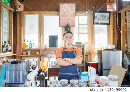 coffee shop waiter standing with crossed arm coffee shop waiter standing with crossed arm 120499001