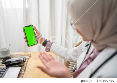 Healthcare Professional Utilizing Smartphone Technology for Telemedicine Engagement Healthcare Professional Utilizing Smartphone Technology for Telemedicine Engagement 120499735