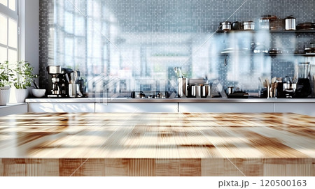 Modern kitchen interior with sunlit wooden countertop and stainless steel appliances 120500163