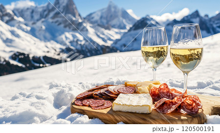 Valentine's Day Date Table Setting with wine and charcuterie in snowy mountain landscape Valentine's Day Date Table Setting with wine and charcuterie in snowy mountain landscape 120500191
