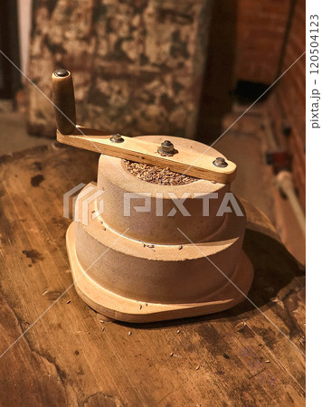 Manual grain mill. Craft beer production. A small business. Manual grain mill. Craft beer production. A small business. 120504123