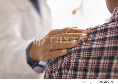 Caring female nurse touch shoulder of older man during conversation Caring female nurse touch shoulder of older man during conversation 120505191
