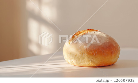 白いリネンの上に置かれた黄金色のパン 120507938