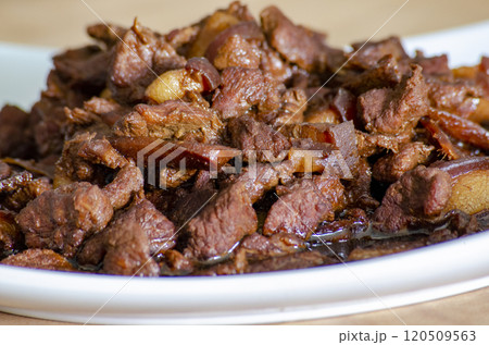 Delicious pork cooked in soy sauce. Asian food concept 120509563