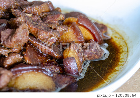 Close up of pork cooked in soy sauce with customizable space for text. Asian food concept Close up of pork cooked in soy sauce with customizable space for text. Asian food concept 120509564