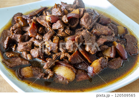 Top view of pork cooked in soy sauce with customizable space for text. Asian food concept Top view of pork cooked in soy sauce with customizable space for text. Asian food concept 120509565