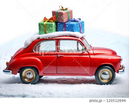 A vintage red car full of gifts on the roof 120512694