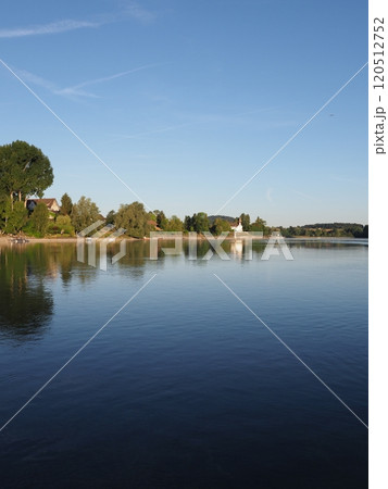 Shoreline of Rhine River in STEIN AM RHEIN town in SWITZERLAND - vertical 120512752
