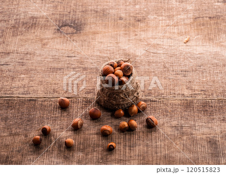 peeled nuts with shell on sacking 120515823