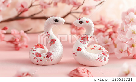 春を彩る白蛇の置物と桜 120516721